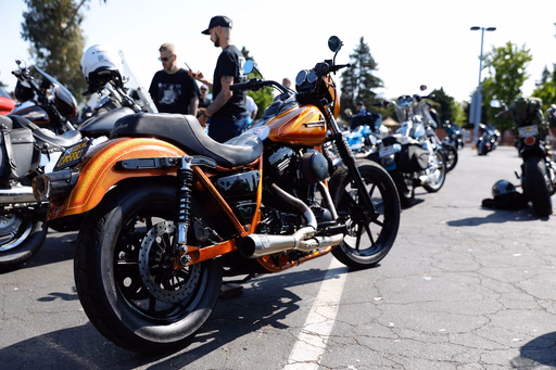Orange Harley-Davidson parked at the swap