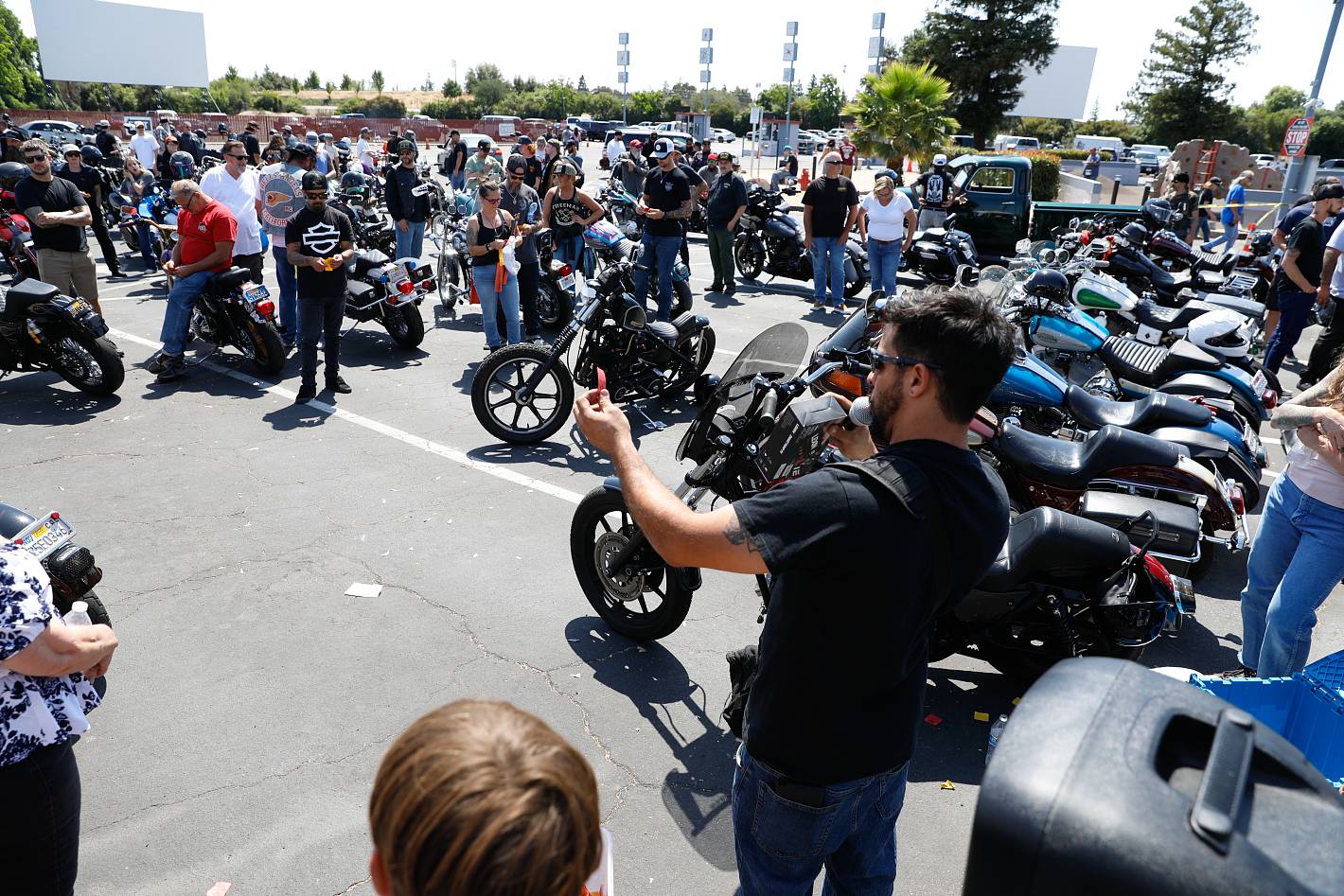 Swap meet crowd checking out motorcycles