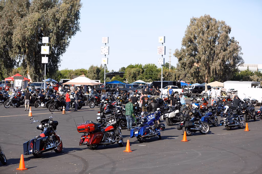 Swap meet lot full of bikes and vendor tents